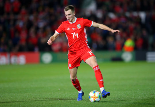 Ryan Hedges in action for Wales.