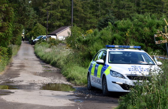 Police at the property near Cumniestown yesterday