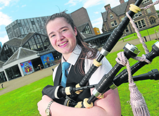 Inverness piper Eilidh MacPhee of Inverness Royal Academy competing in the under-19 piping events. Picture by Sandy McCook.