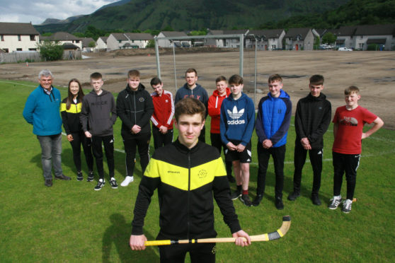 Richard Shaw Captain with the under 17s team of Fort William Shinty Club and officials