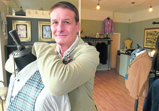 Paul Brock in his Crown menswear shop which he hopes to convert to a cafe if planning permission is granted.
Picture by Sandy McCook