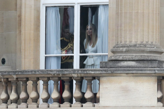 LONDON, ENGLAND - JUNE 03: Ivanka Trump looks out of the window at Buckingham Palace ahead of the visit of US President Donald Trump and First Lady Melania Trump on June 03, 2019 in London, England. President Trump's three-day state visit will include lunch with the Queen, and a State Banquet at Buckingham Palace, as well as business meetings with the Prime Minister and the Duke of York, before travelling to Portsmouth to mark the 75th anniversary of the D-Day landings. (Photo by Chris Jackson/Getty Images)