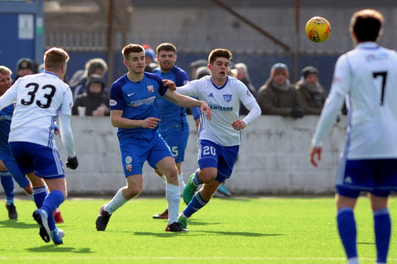 Jamie Redman in action against Peterhead last year.