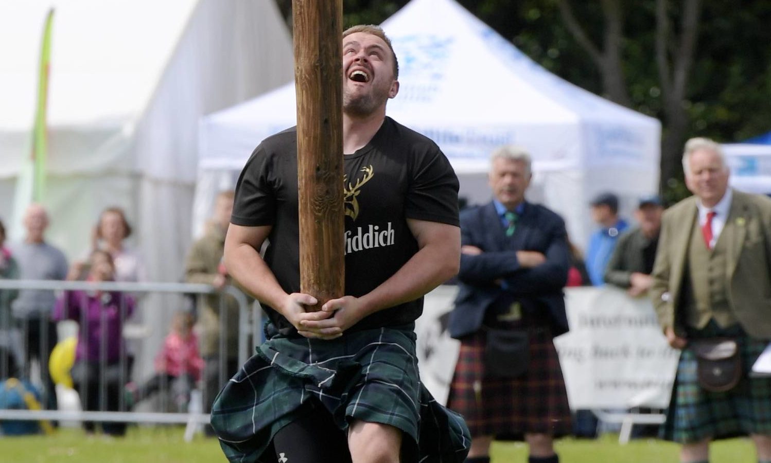 Tossing the Caber at 2019 Aberdeen Highland Games.
Picture by Kath Flannery.