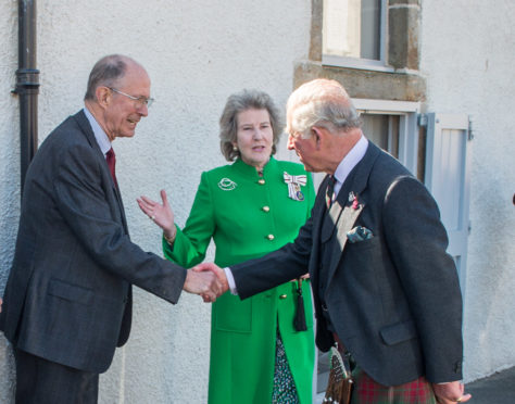 Prince Charles introduced to vice-Lieutenant of Banffshire Roger Goodyear by Clare Russell Lieutenant of Banffshire weeks before Mr Goodyears death