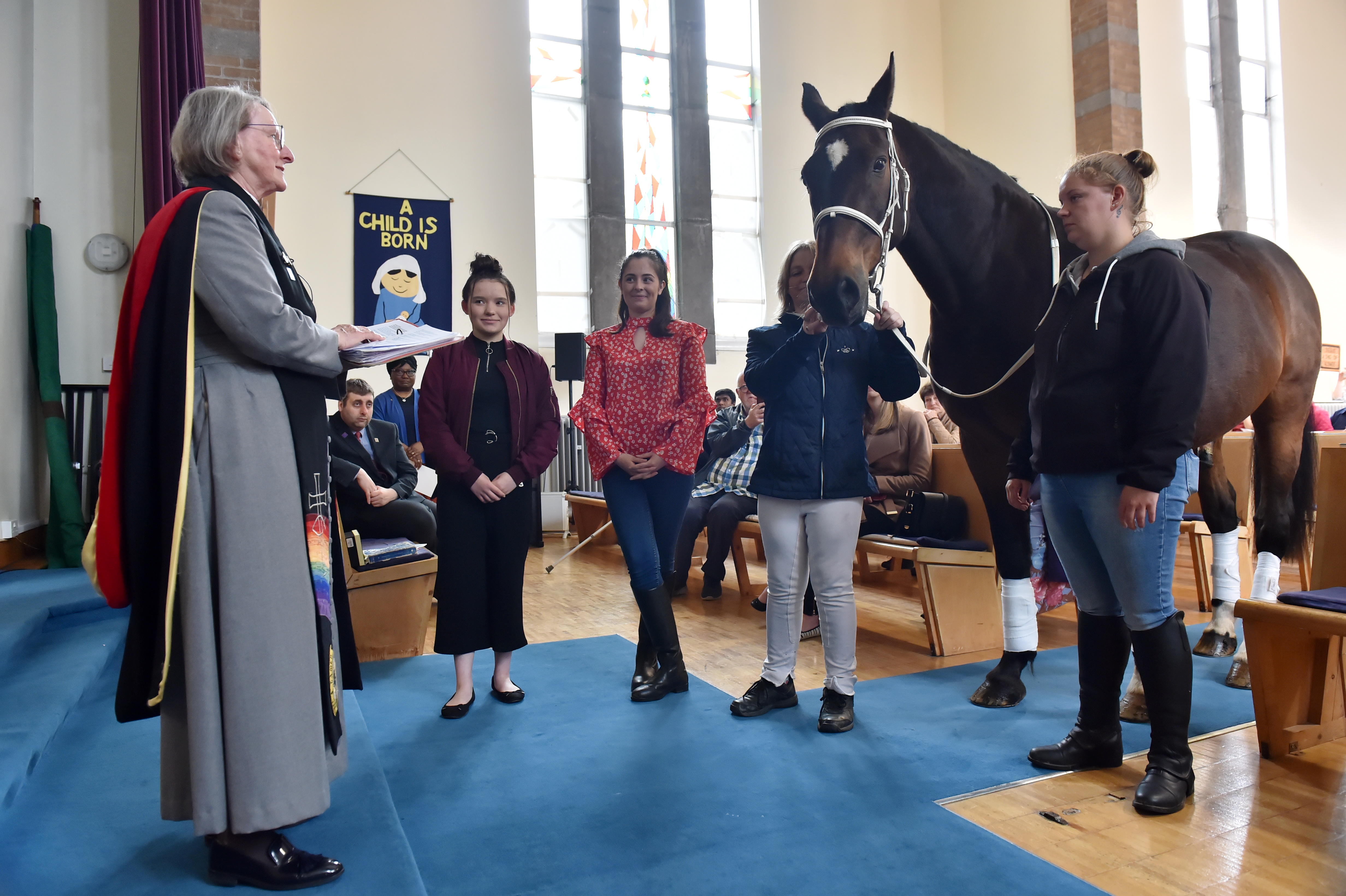 Rev Flora Munro and Ollie the horse during the service.