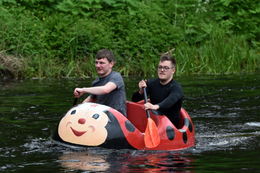 Hundreds turned out to watch the Inverurie Raft Race. Picture by Kenny Elrick.