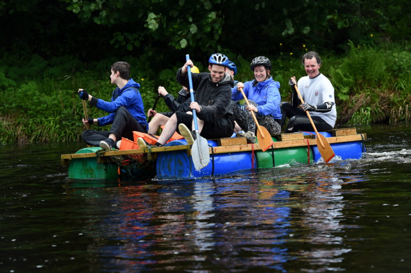 Hundreds turned out to watch the Inverurie Raft Race. Picture by Kenny Elrick.