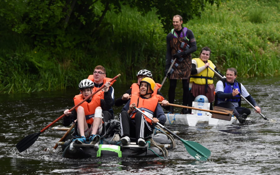 Hundreds turned out to watch the Inverurie Raft Race.  Picture by Kenny Elrick.