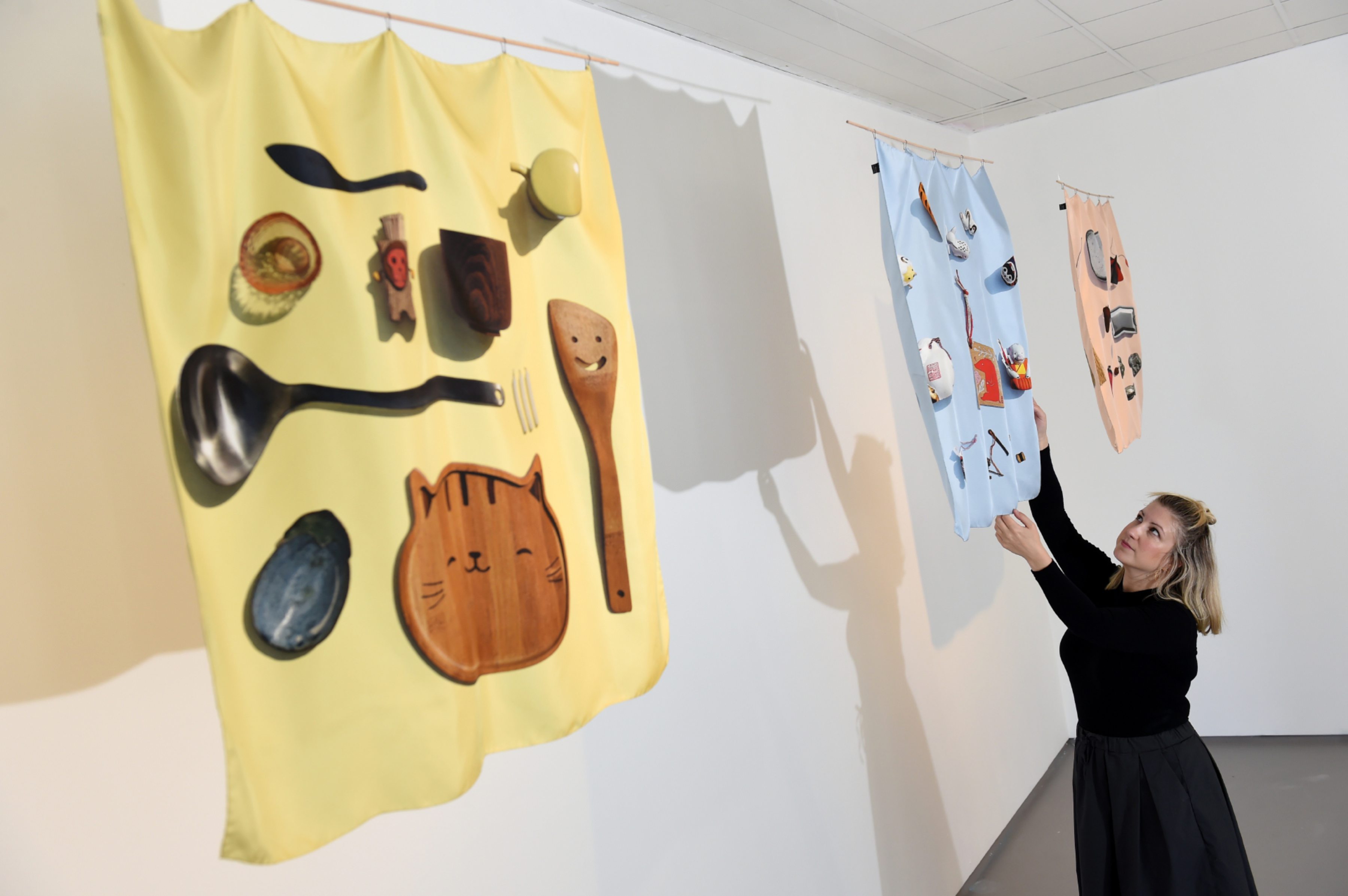 Dr Stacy Hunter with her exhibition.

Picture by Kenny Elrick