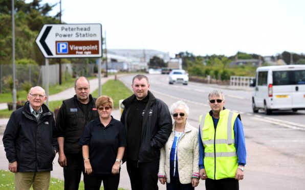 Left to right: Neil Wilson (resident), Alistair Fuerst (resident), Lynne Anderson (resident), Paul Anderson (owner Central Taxis), Irene Duncan (Community Council) and Irvine Simpson (community council) fear for their lives when it comes to the A90        
Picture by Kami Thomson