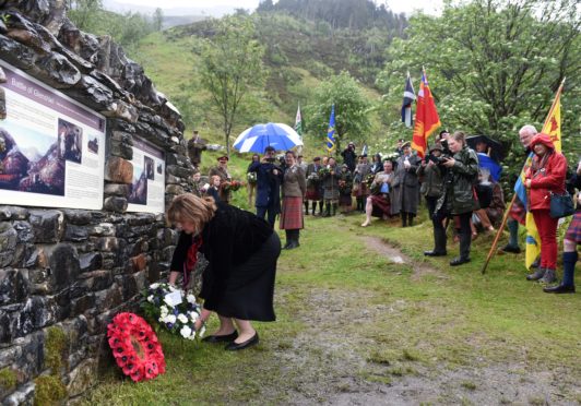 Cabinet Secretary Fiona Hyslop lays her wreath at the tercentenary commemoration of the Battle of Glenshiel.