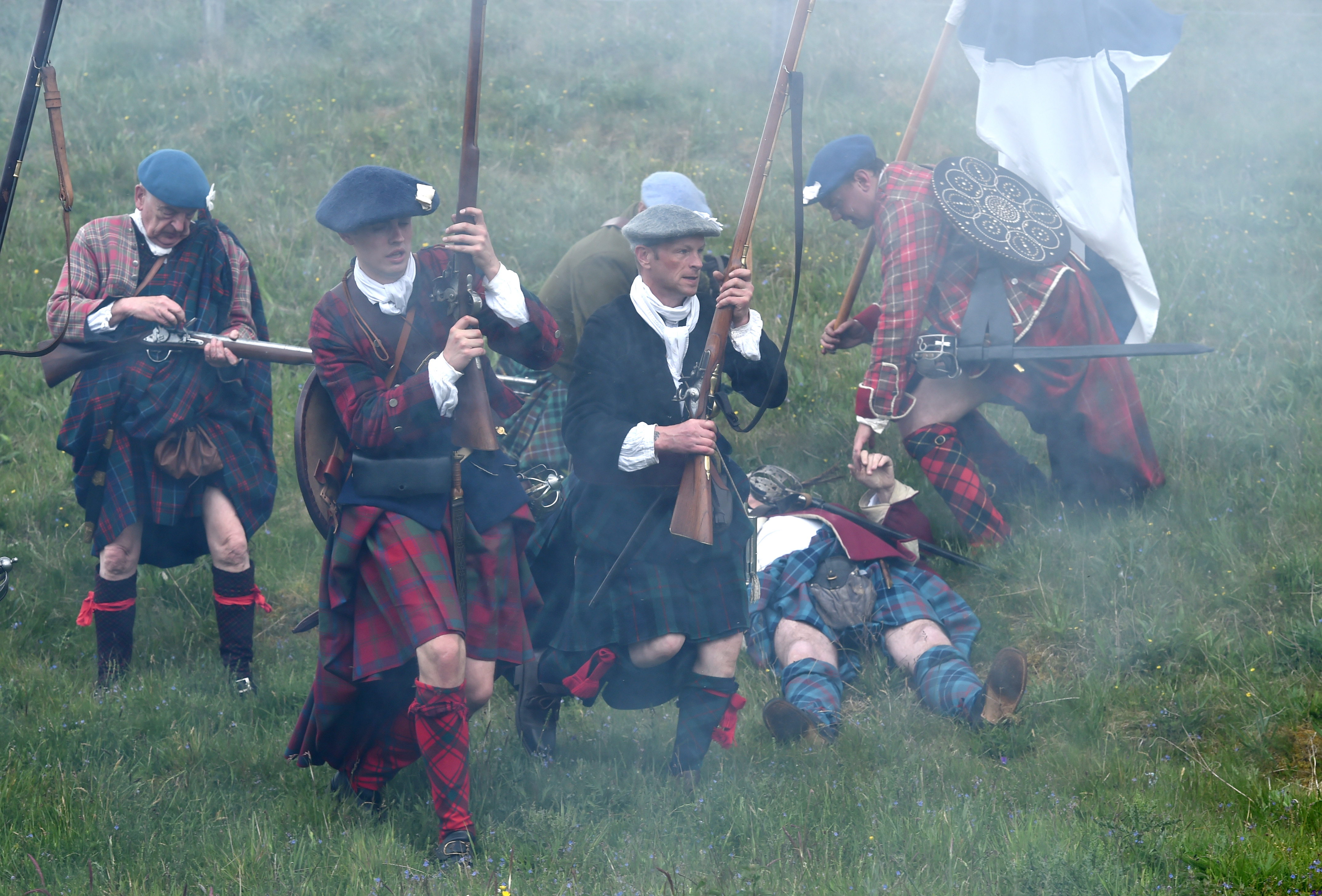 Battle re-enactment at the Highland Folk Museum, Newtonmore as members of the Alan Breck's Prestonpans Volunteer Regiment play the roles of the Edinburgh City Guard and also the Jacobites.