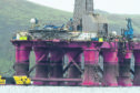 A helicopter arrives on the BP-Contracted rig in the Cromarty Firth. 
Picture by Sandy McCook