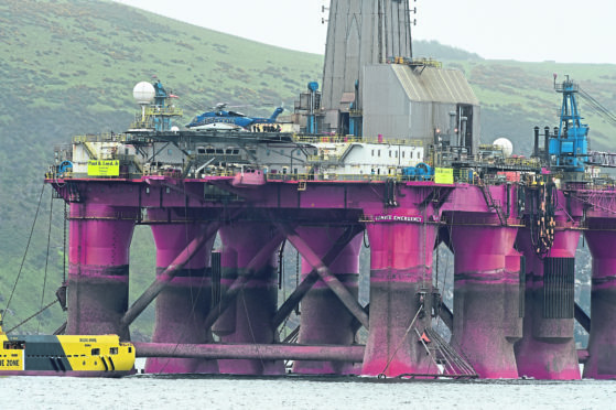 A helicopter arrives on the BP-Contracted rig in the Cromarty Firth. 
Picture by Sandy McCook