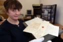 Assistant archivist Eilidh MacColl shows four letters from Anne Lister, Gentleman Jack, to her friend Lady Vere Cameron of Locheil. 

pics by Sandy McCook
