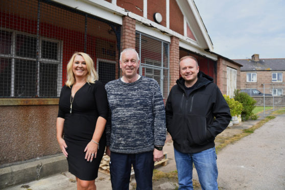 CONTRACTOR KEN BARBOUR (CENTRE)  WITH PETERHEAD AREA COMMUNITY TRUST MEMBERS GRAHAM MACKIE AND DIANNE BEAGRIE AT THE BARCLAY PAVILION