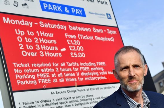 PETERHEAD BID CHAIRMAN JOHN PASCOE IS CONCERNED OVER THE WITHDRAWAL OF THE 1 HOUR FREE PARKING IN COUNCIL CAR PARKS.