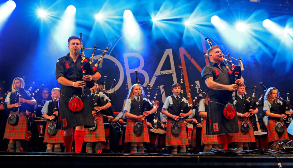 The Red Hot Chilli Pipers with Oban High School Pipe Band