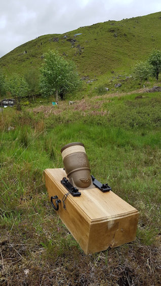 A relica Coehorn mortar near where archaeologists are working at Glenshiel