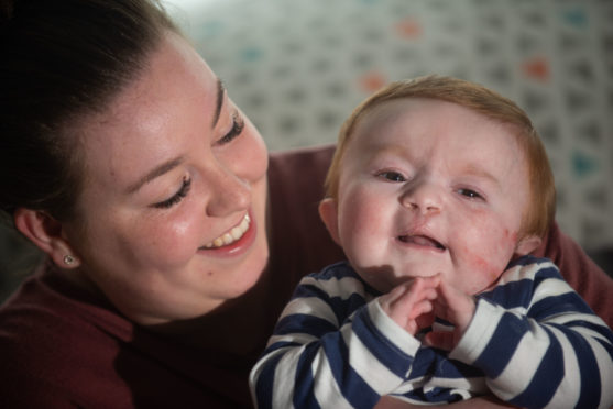 Baby Ollie with proud mum Jessica Reid.