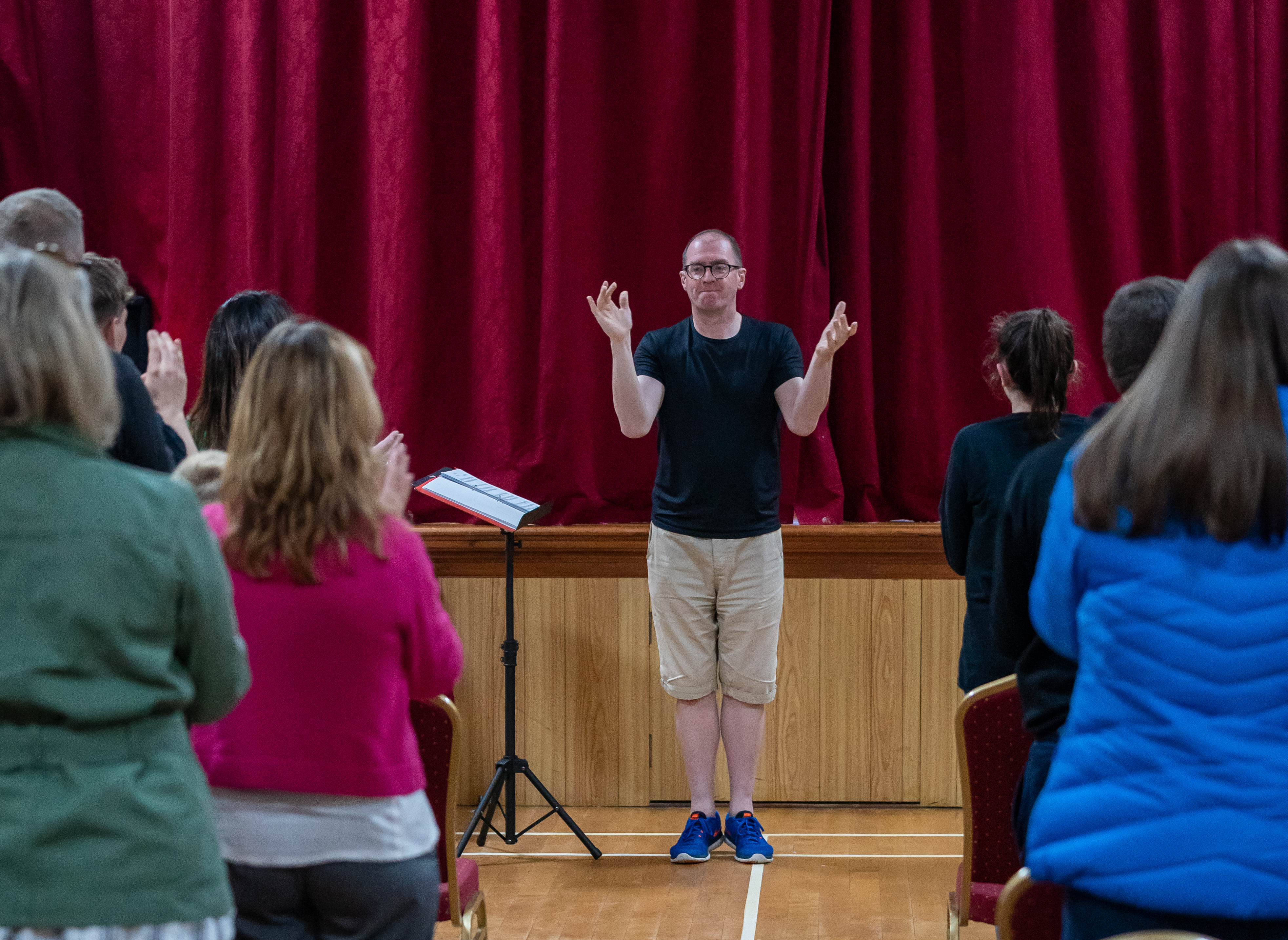 Dr Paul Whittaker, CBE takes a learn to sing in sign language workshop.