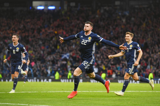 Scotland's Oliver Burke celebrates his late goal against Cyprus earlier this year.