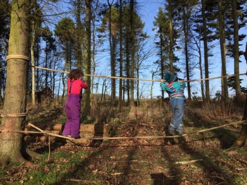 Youngsters enjoy outdoor play at Earthtime Forest School in Duffus, Moray