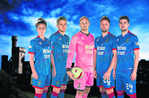 The new strip modelled by (L-R)
Natalie Bodiam, Coll Donaldson, Mark Ridgers, Brad McKay, Charlie Trafford.
Picture by Trevor Martin