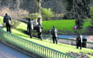 Police Scotland officers search Union Terrace Gardens following the assault Aberdeen
