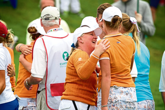 Great Britain & Ireland captain Elaine Farquharson-Black celebrates with Meghan MacLaren