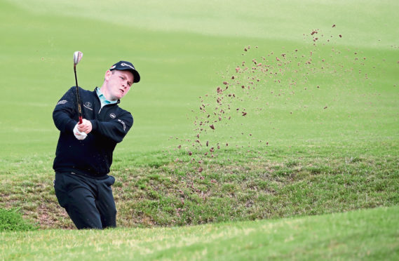 Scotland's Robert MacIntyre in the bunker on the 12th hole during day two of the Aberdeen Standard Investments Scottish Open at The Renaissance Club, North Berwick.