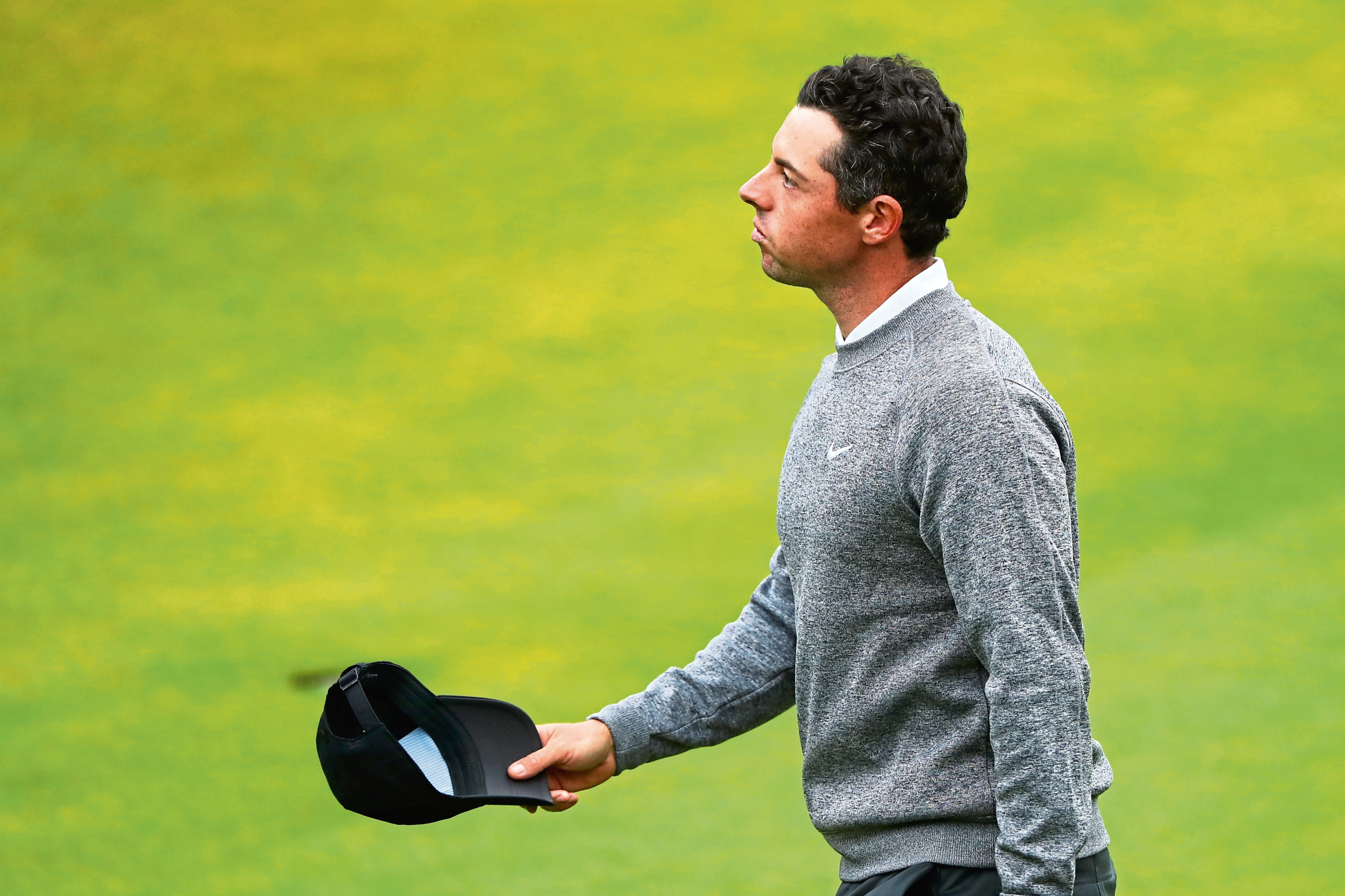 Rory McIlroy of Northern Ireland reacts on the 18th during the second round of the 148th Open Championship held on the Dunluce Links at Royal Portrush Golf Club on July 19, 2019 in Portrush, United Kingdom. (Photo by Francois Nel/Getty Images)