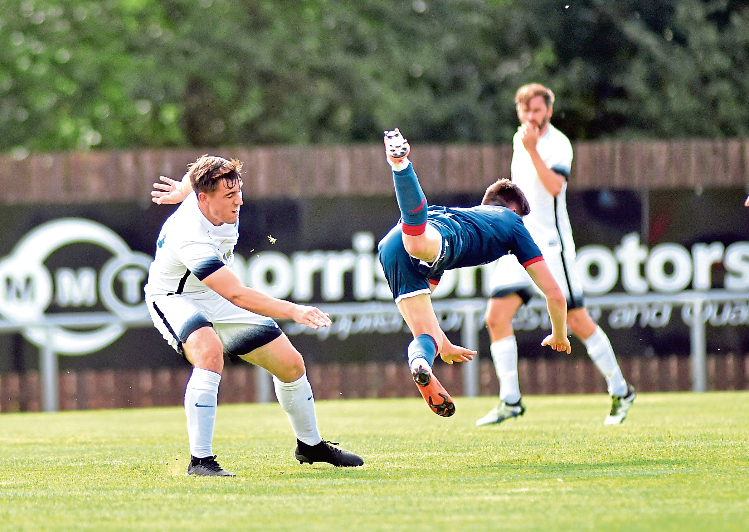 James McShane tackling Turriff United' Keir Smith.    Picture by Scott Baxter