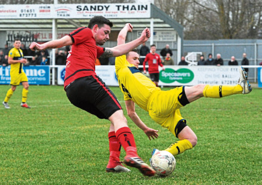 Breedon Scottish Highland League.
Inverurie Loco Works (red) v Wick Academy (yellow) at Harlaw Park, Inverurie.
Picture of (L-R) Colin Charlesworth and Gary Manson.

Picture by KENNY ELRICK     23/02/2019