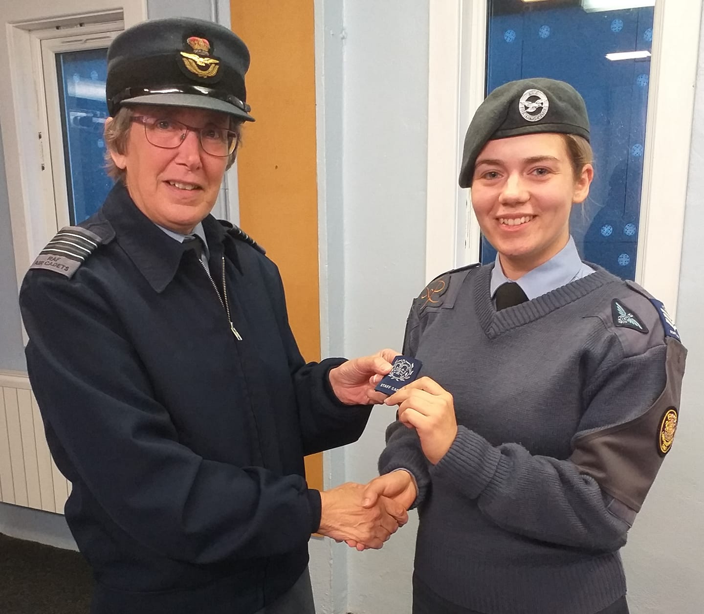 Cadet Warrant Officer Georgi McMinn being promoted by Highland Wing Commander Christine Copsey.