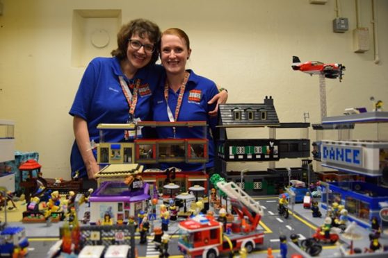 Tartan LUG chairwoman Christine Aird, left, with Alison Clayton and her display in Peterhead Prison Museum