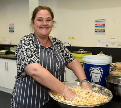 Kelly Donaldson taking part in cooking classes