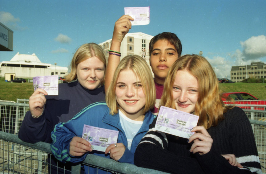 Oasis fans Andy Rae; Katy Smith; Emily Millichip, Ann Marie Dunbar are first in the queue for the concert at the AECC in September 1997.