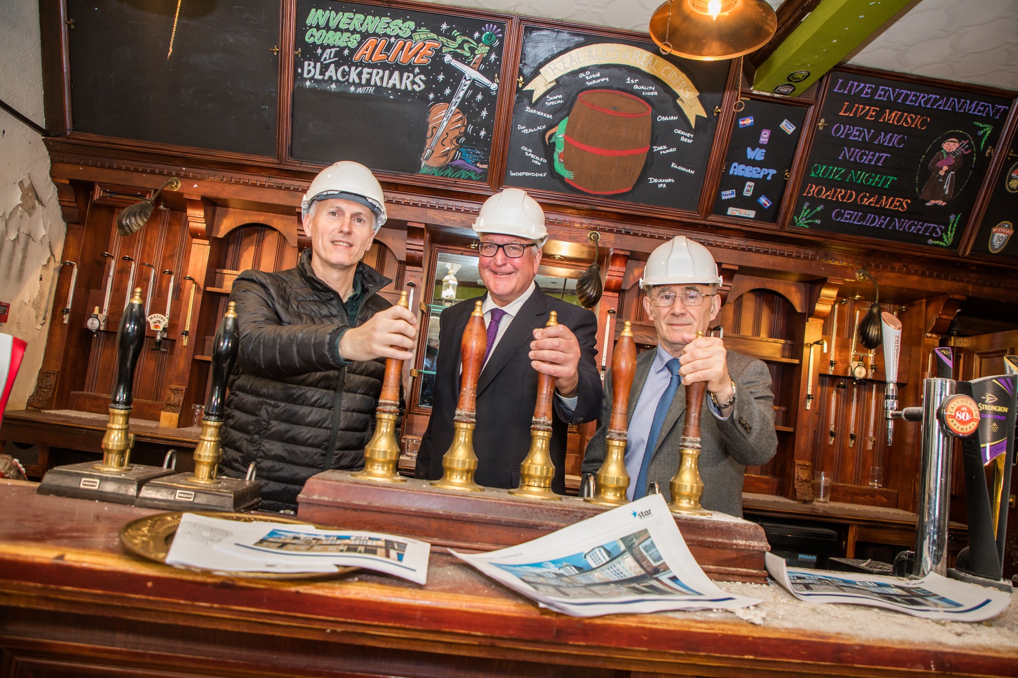 Brian Davidson, operations director for Scotland at Star Pubs & Bars; Fergus Ewing MSP, Cabinet Secretary for Rural Economy and Highland Councillor, Jimmy Gray, chairman of the
Inverness Townscape Heritage Partnership