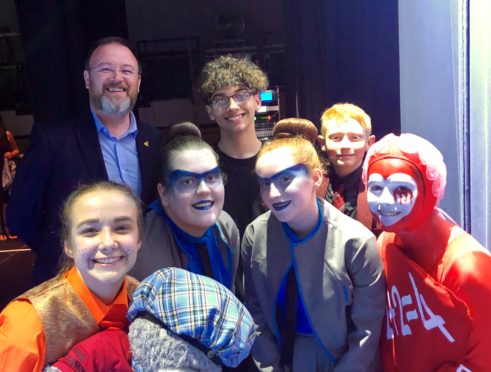 MP David Duguid with Peterhead Academy pupils at the Rock Challenge final