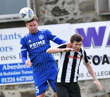 Peterhead defender Mick Dunlop (left).