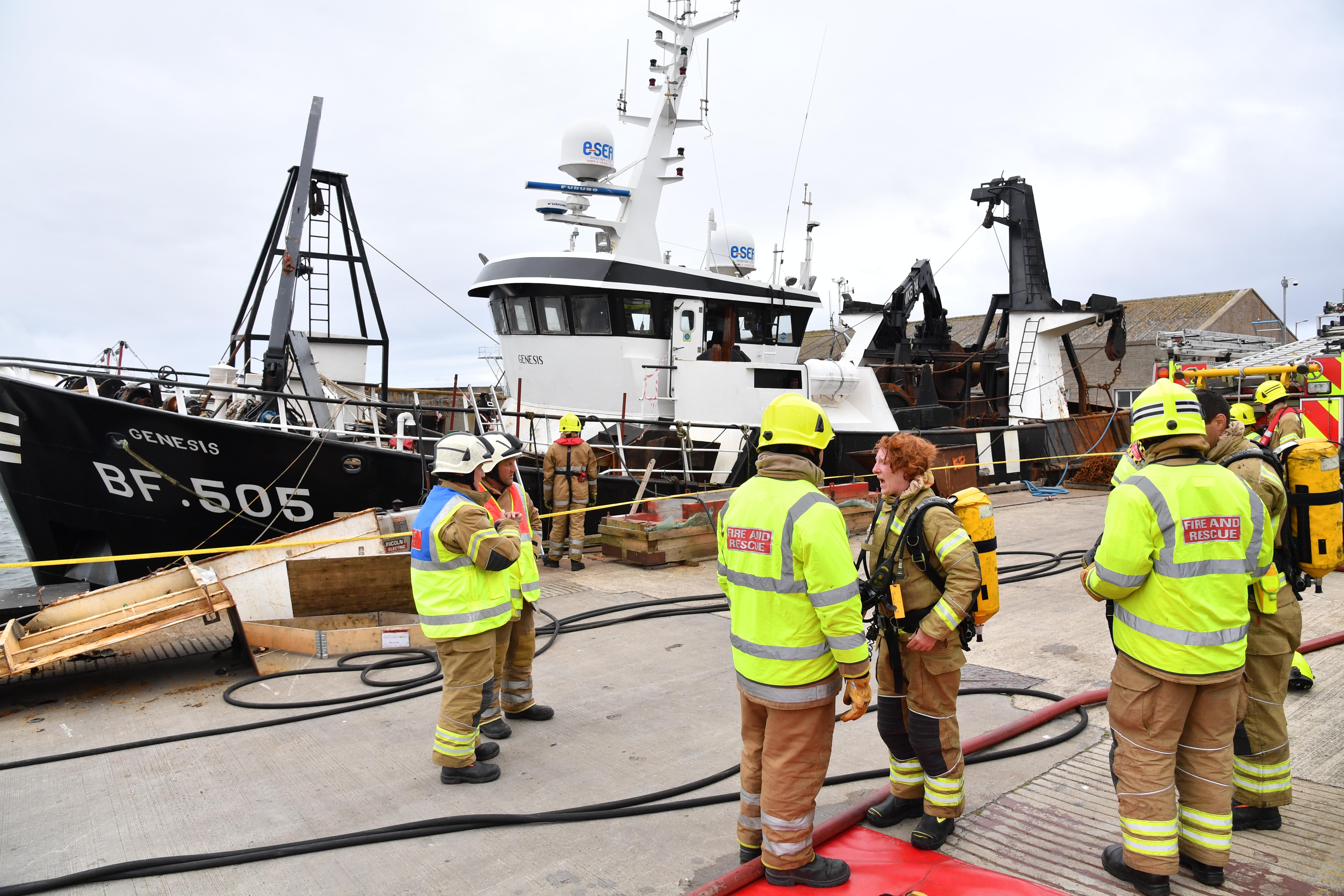 Fire crews at Macduff Harbour yesterday