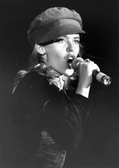 Kylie Minogue performing at the AECC in 1990.