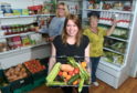 The Woodside Pantry with  Claire Whyte, with volunteers Jill Bertram and Vi Beattie.