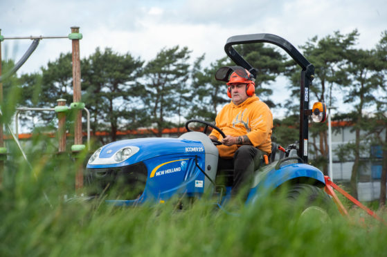 A grass cutter is pictured at Doocot Park, Moray.