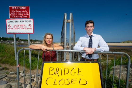 Carolle Relph, vice-chairwoman of Lossiemouth Community Council, and Huw Williams, development officer for Lossiemouth Community Development Trust, at the East Beach bridge in Lossiemouth.