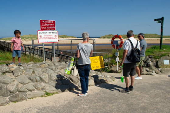 Sun-seekers turned away from Lossiemouth's East Beach due to the bridge closure.