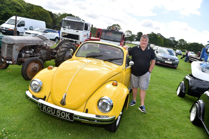 John Macaskill. with his 1971 VW Beetle Convertible, 


Picture by Scott Baxter