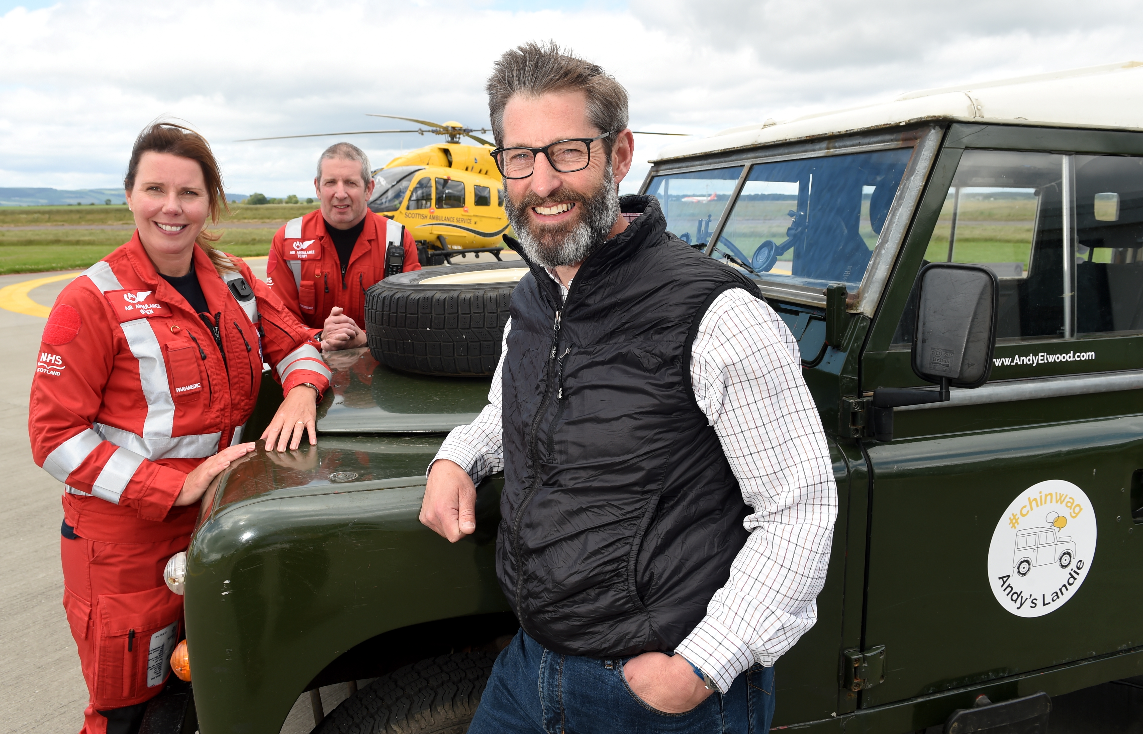 Andy Elwood with aircrew paramedics Gwen Bain and Terry Cheetham at the Scottish Ambulance Service air ambulance base at Inverness airport